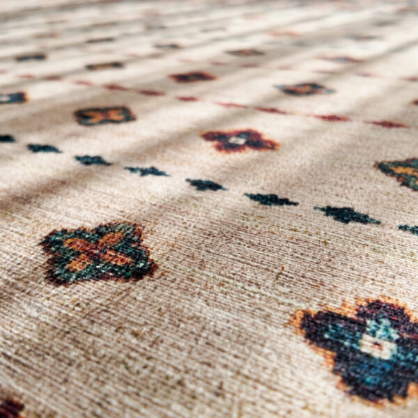 Close-up of patterned carpet shows detail and texture,